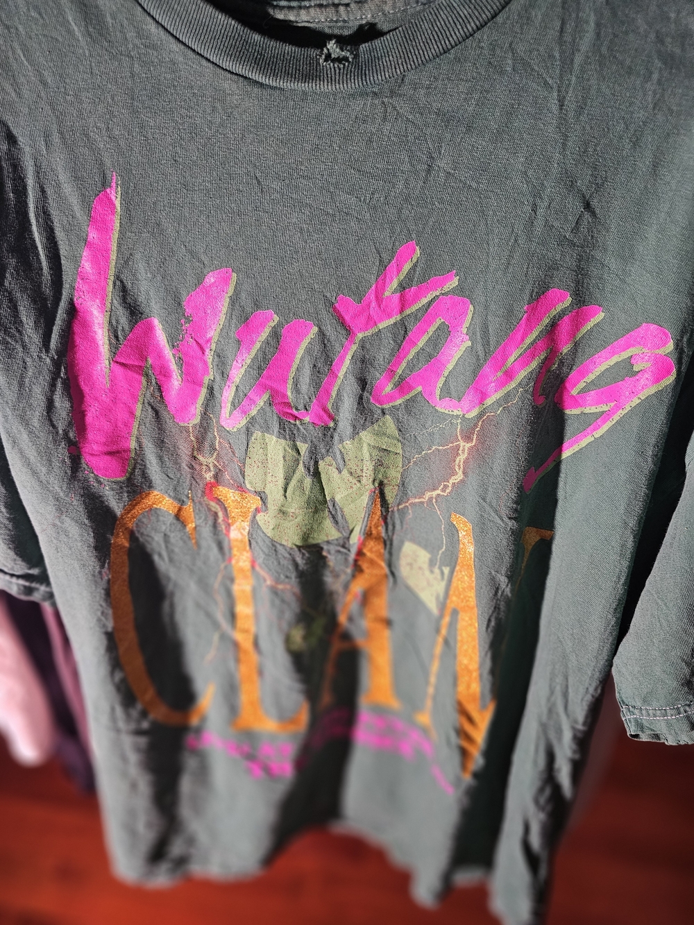 Vintage-Style Black Graphic Men's T-Shirt with Pink & Orange Print